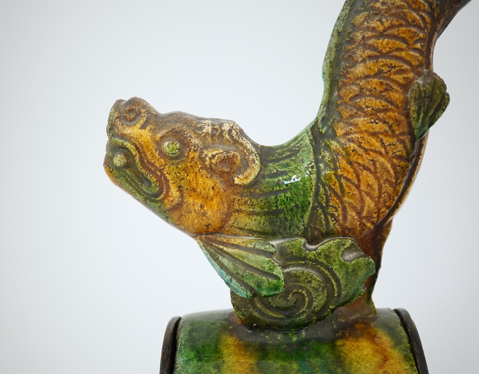 Two Chinese sancai ‘dragon-fish’ ridge tiles, Ming dynasty, c.1580-1620